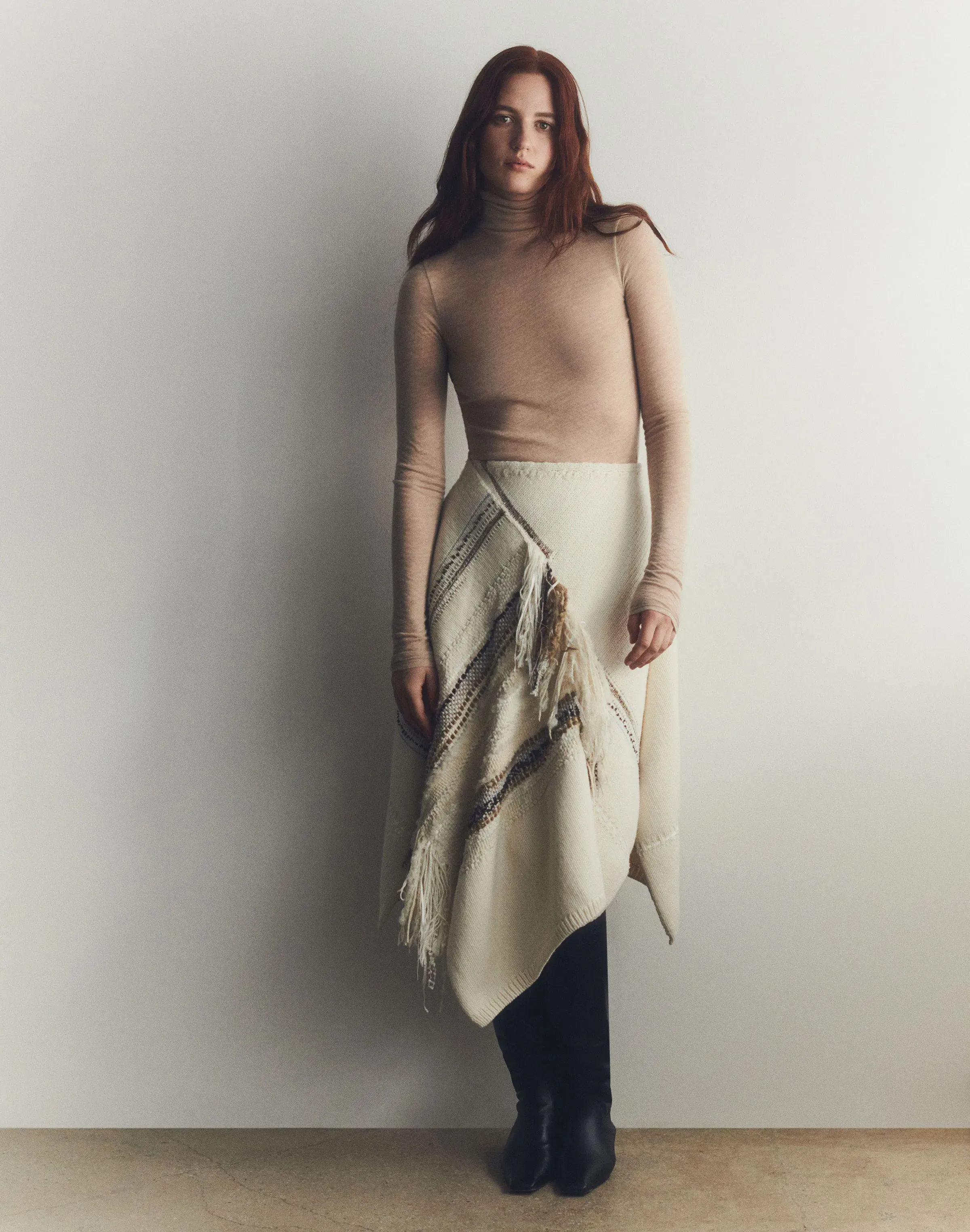 Cashmere Jersey Turtleneck and Handwoven Fringe Skirt